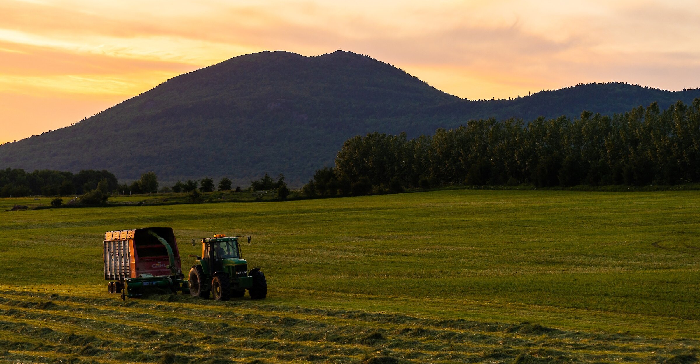 A tractor in the fields in the Eastern Townships