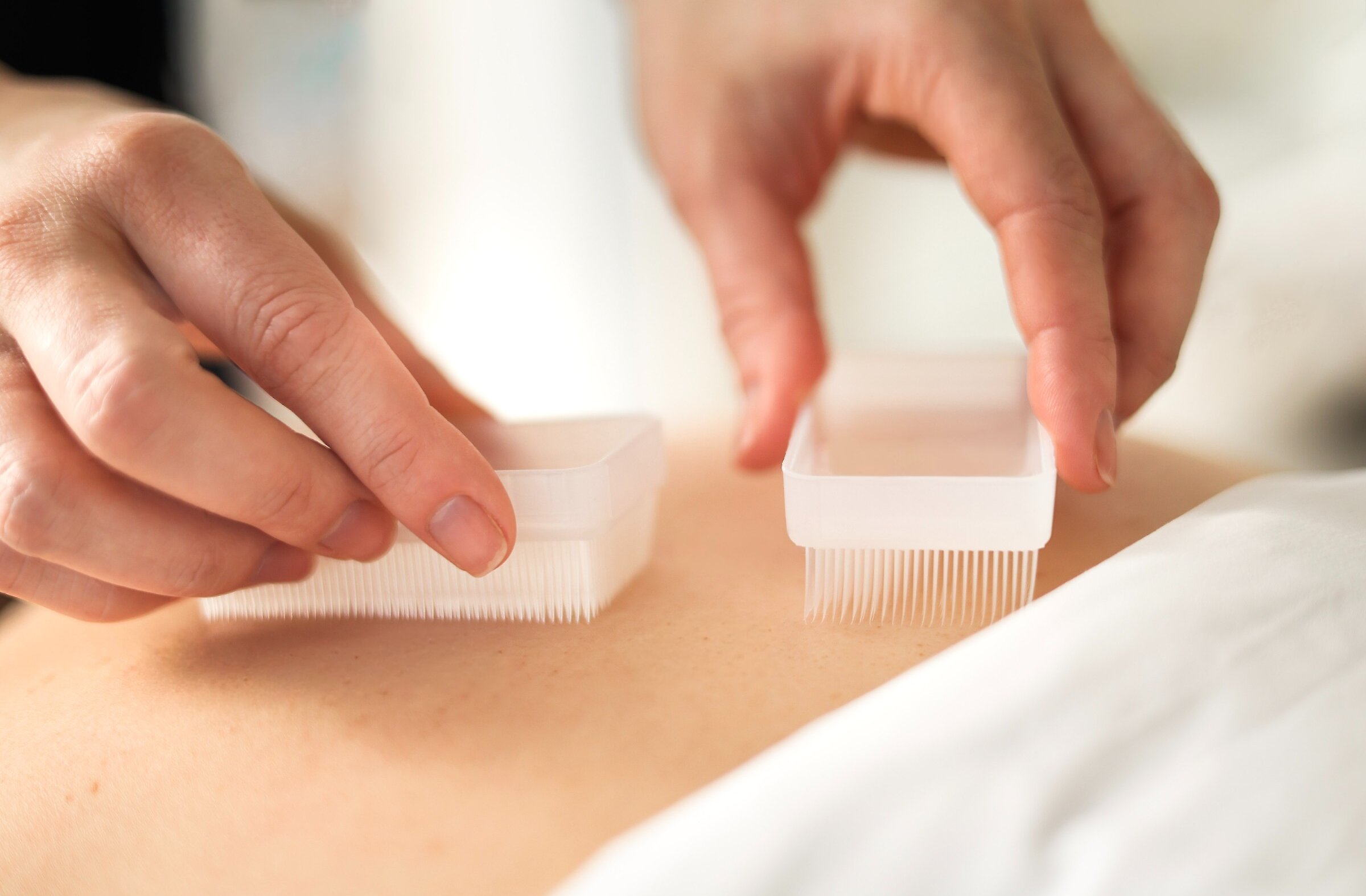 Relaxing spa treatment with gentle brushing massage