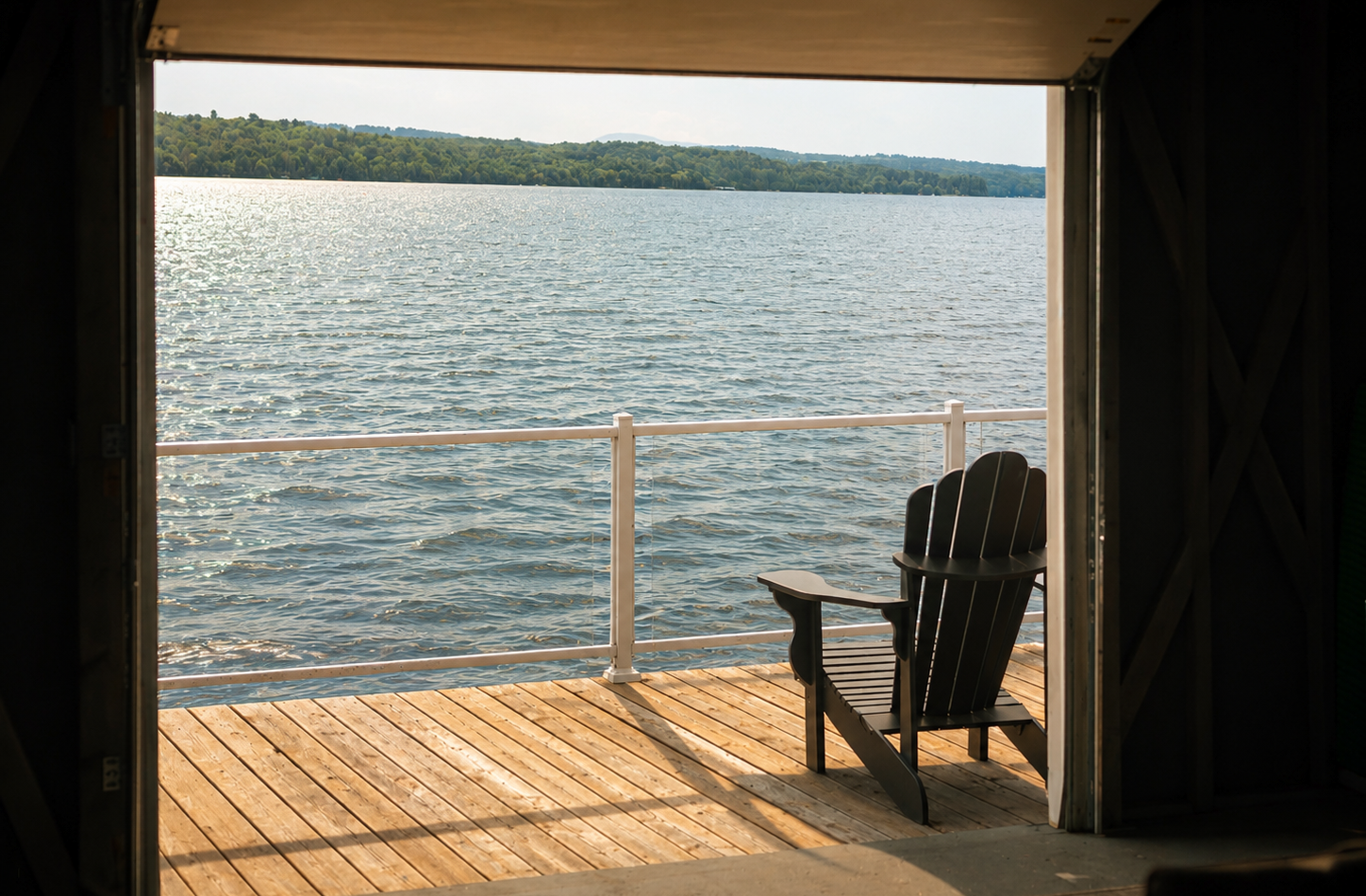 A wooden chair by the water's edge.