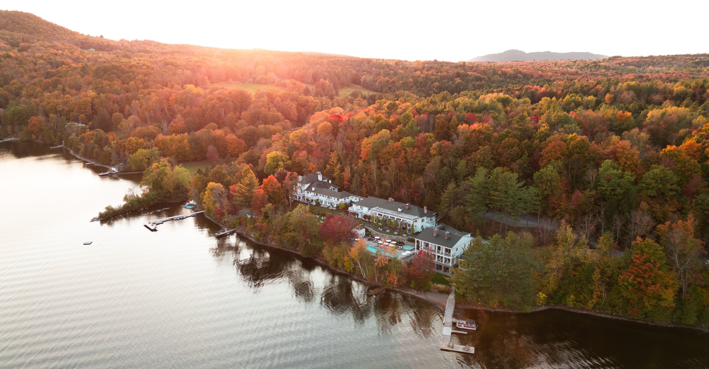 Aerial view of a hotel by a lake