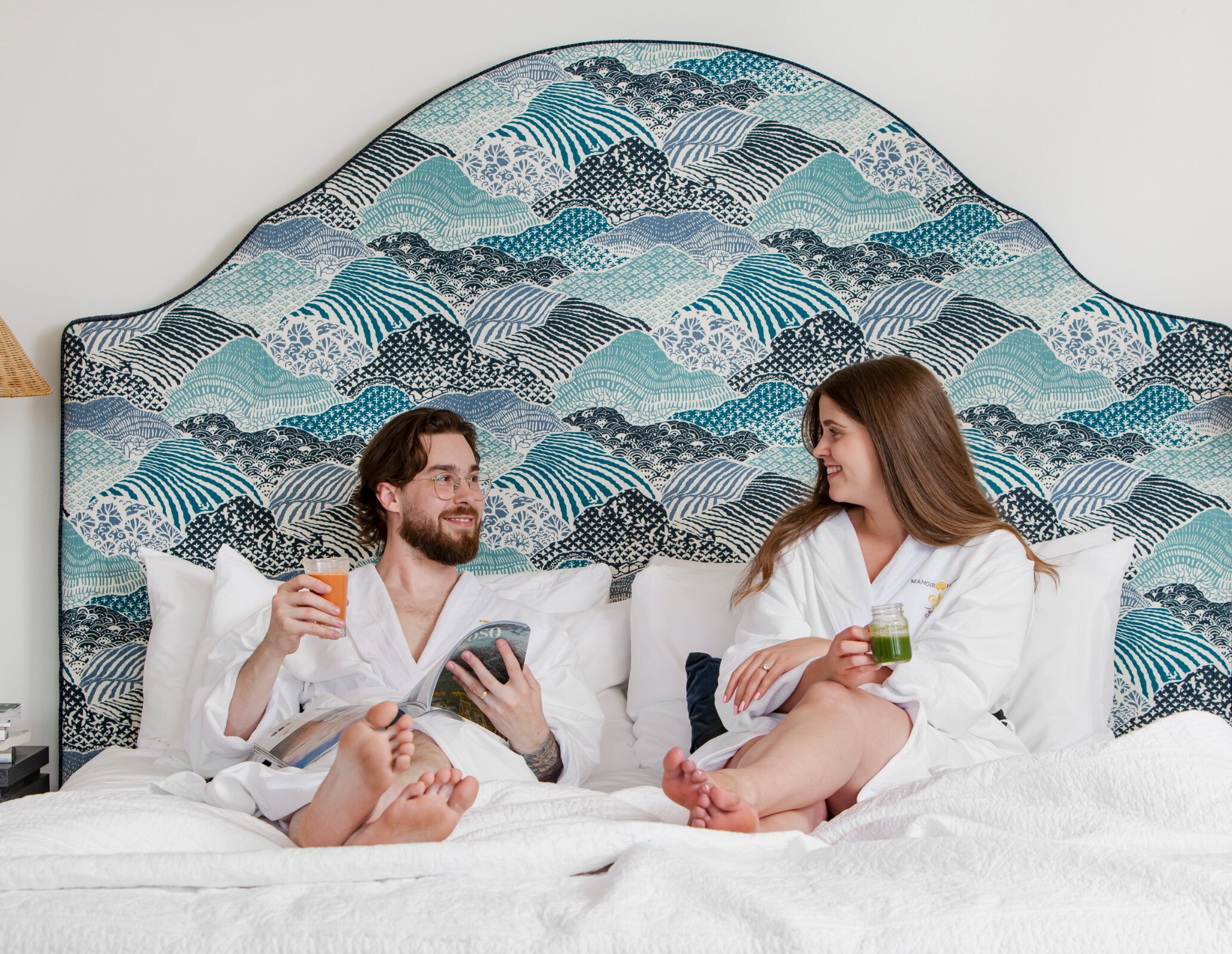 A couple having breakfast in bed