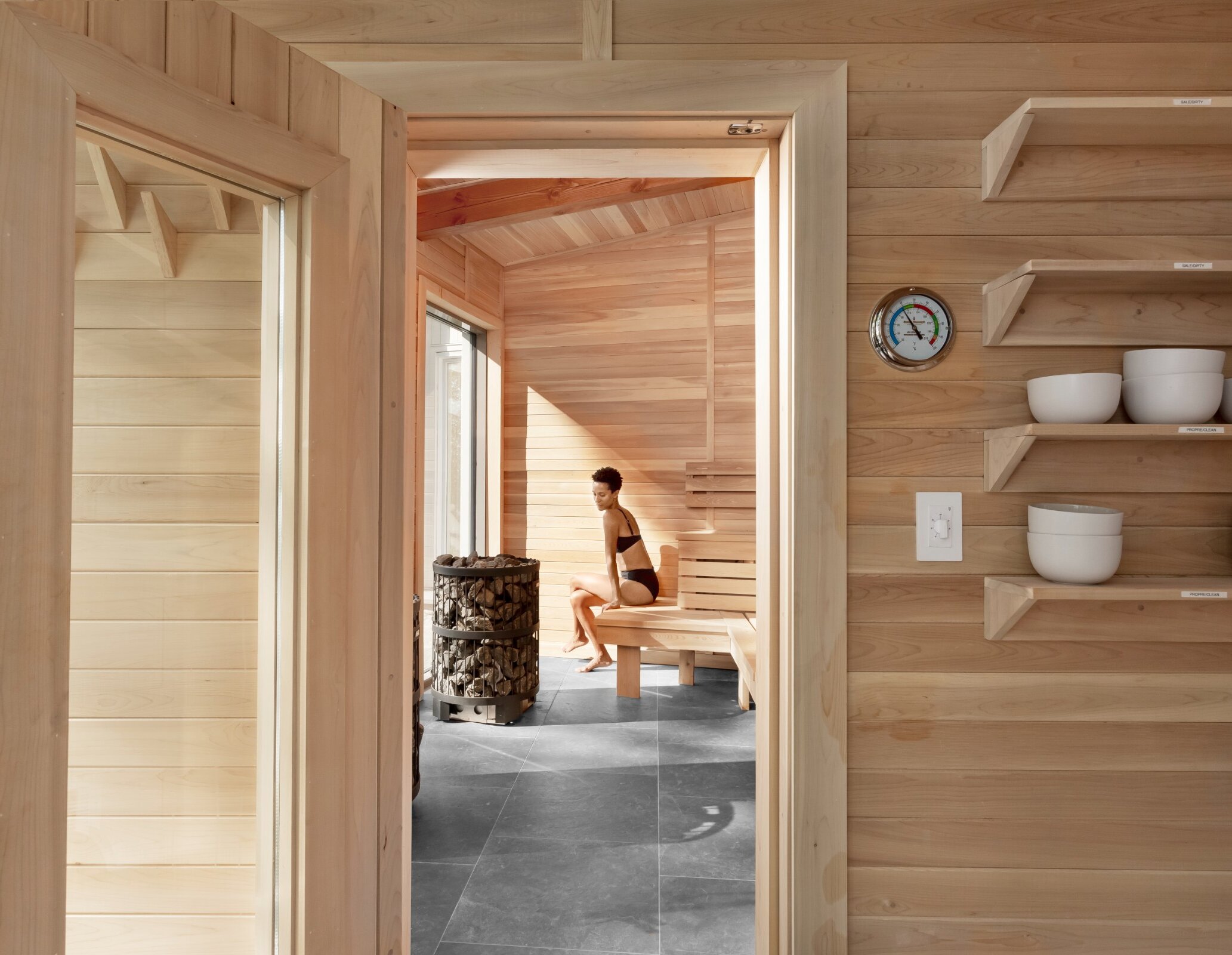 A woman relaxing in a sauna