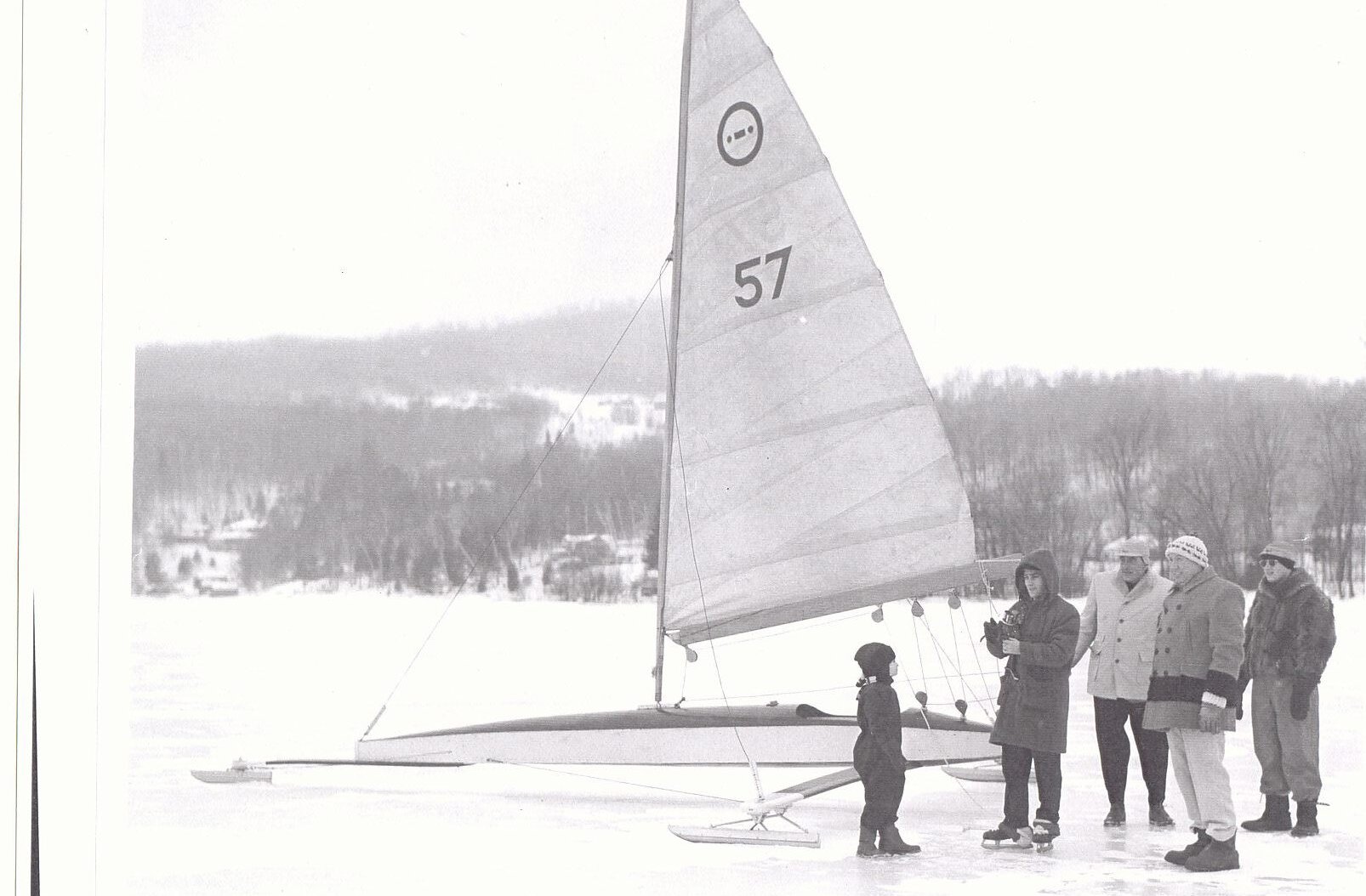 People on the frozen lake in winter
